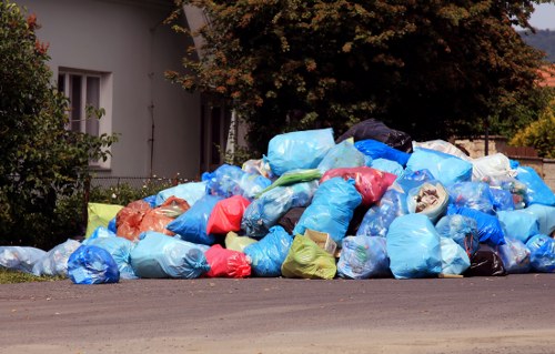 Homeowners disposing of trash