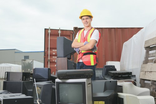 Workers managing construction debris for waste clearance